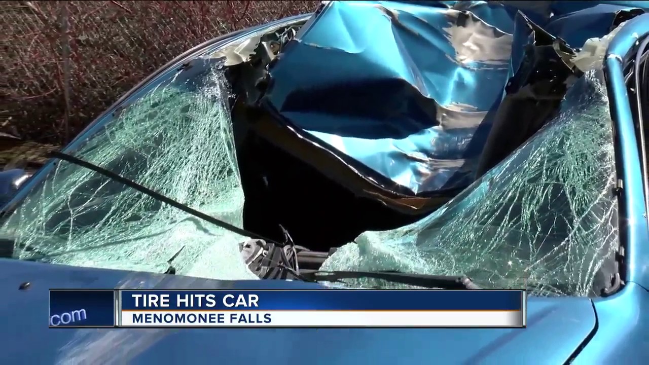 Tire flies from semi and hits car YouTube