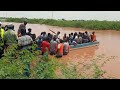 Moments the illfated boat carrying 53 passengers departs before it was swept away by the floods