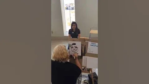 NH Caricature artist Erica drawing caricatures in ...