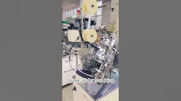insert two slider mounting machine #zippermachine #zippermakingmachine #zipper