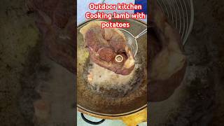 Outdoor kitchen, cooking lamb with potatoes #outdoors #wildlife #cooking