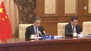 China: Global challenges require major countries to set aside biases and unite