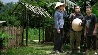 Mr. Chuc and Hoa came to help Manh rebuild the gate after it was damaged by a natural disaster