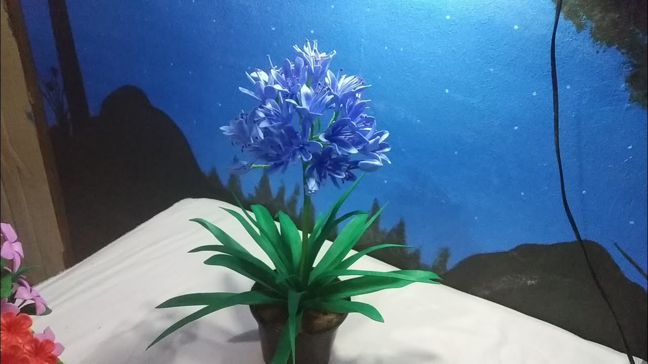 Como fazer uma linda flor com o nome Agapanthus em EVA sem frisador 🤗😍