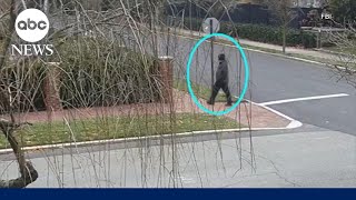 FBI video shows man sought in Brown University shooting near police after attack