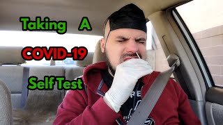 Taking a COVID-19 Self Test at Walgreens after having a number of symptoms for a few days
