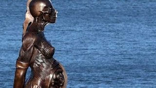 Damien Hirst's 'Verity' statue divides Devon town