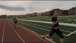Girl Runner In Full Black Clothing Hocks Spit During Training Sesh