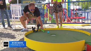 WCCO stars battle at the State Fair's Can Can Wonderland Mini Golf On-A-Stick