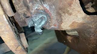Extract/remove seized/rusted hub assembly bolts with torch release pressure by cutting lines in hub