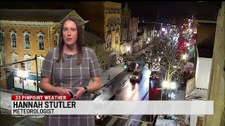 Snow showers taper off tonight