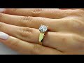 Solitaire round cut diamond cathedral engagement ring in yellow gold mvs0003y