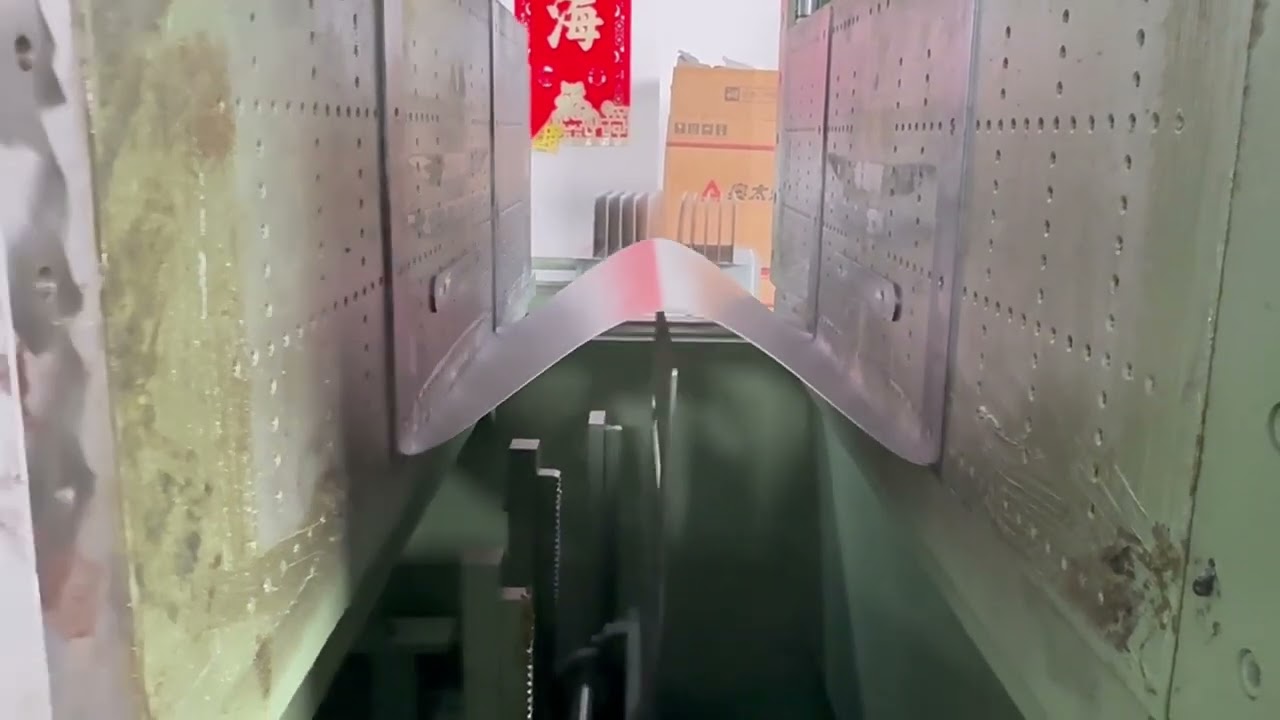 TRANSFORMER FIN FOLDING MACHINE