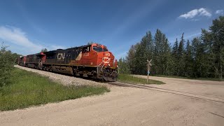 CN 3033 leads a southbound A459 w/ @NorthernAlbertaRailfan and flat cars with oversize loads