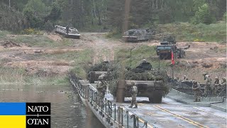 Hundreds of US Military Vehicles Arrive in Poland and Cross the River to Enter Ukraine