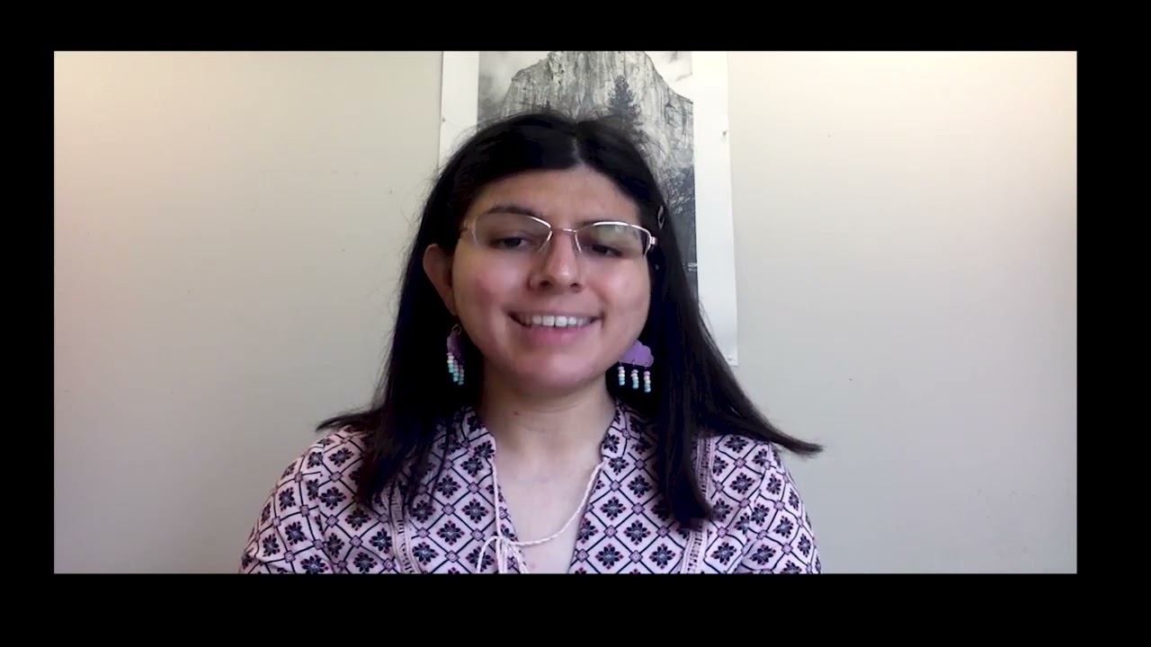 Angela Acosta performs the poem "Ad Astra, Our Motto" / "Ad astra, nuestro lema"