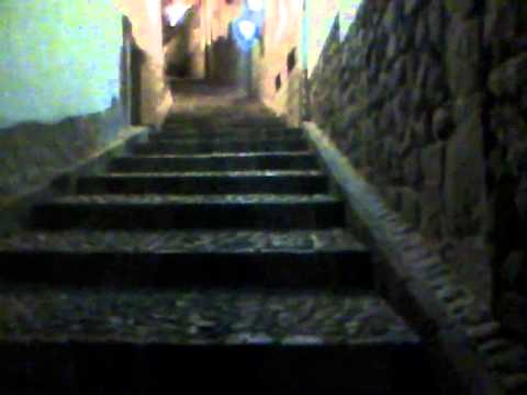 Cusco Attempting To Climb The Steps To Hostal Resbalosa