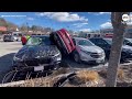 Tight spot: Driver gets wedged between cars in Massachusetts parking lot