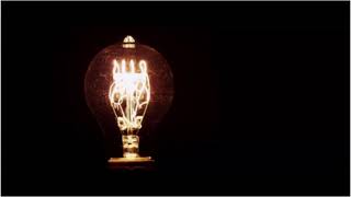 Vintage Light Bulb Turning On And Turning Off In The Darkness  Free No Copyright 4k Stock Footage