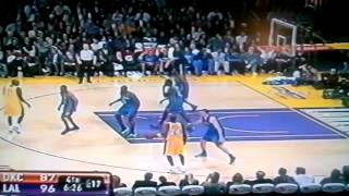 Kobe goes around Nick Collison for dunk