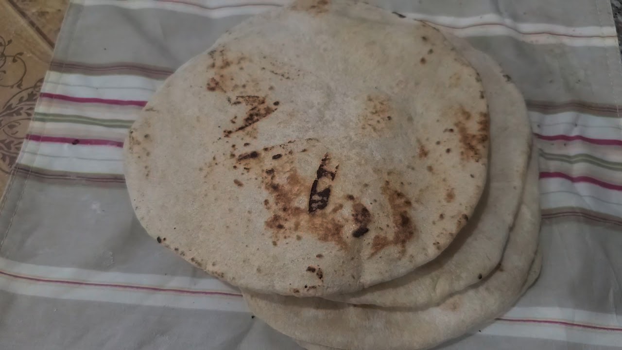 My 67 year old mom making Roti for me in Guyana 🇬🇾 December 2020 - YouTube