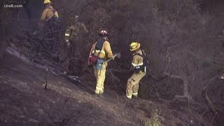 Crews mopping up two brush fires in San Diego