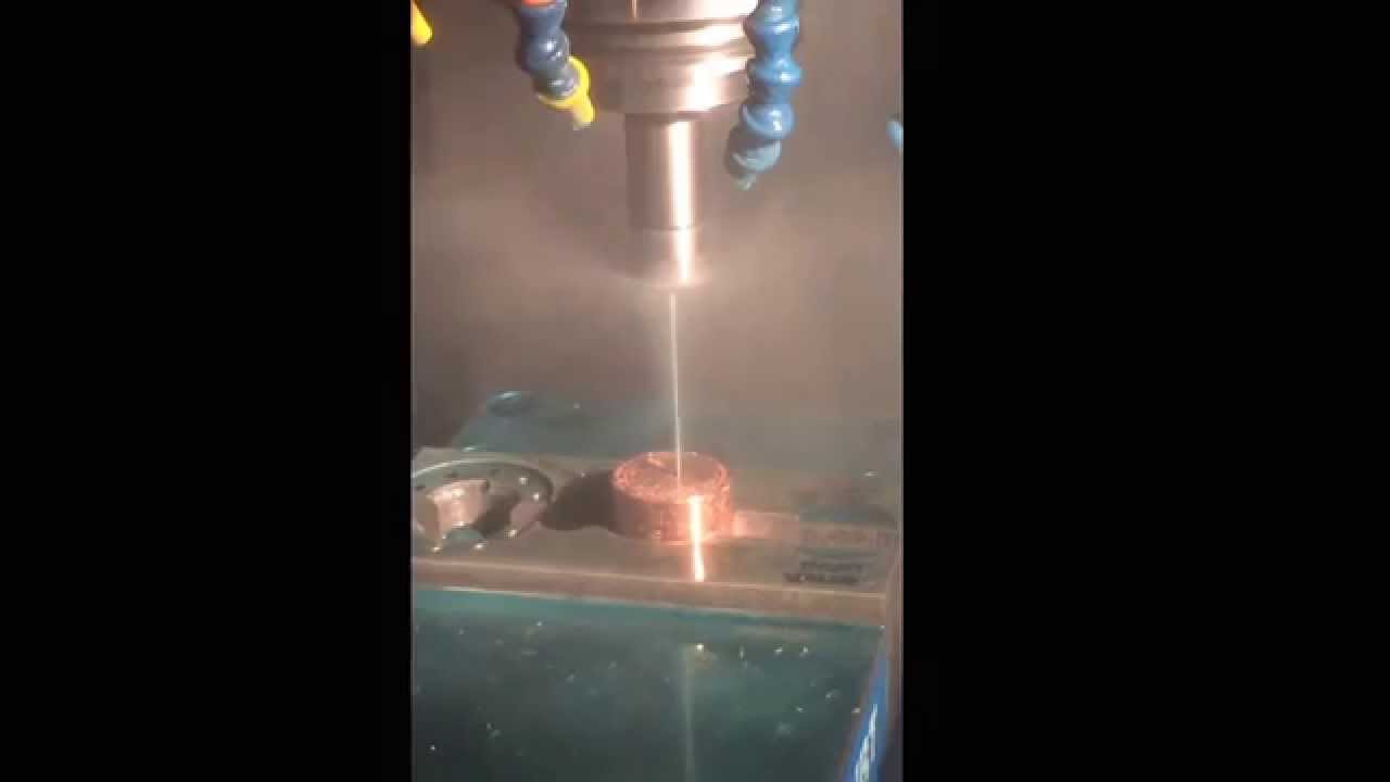 Guhring coolant fed gun drill .059 diameter. Thru 2" of copper... speed