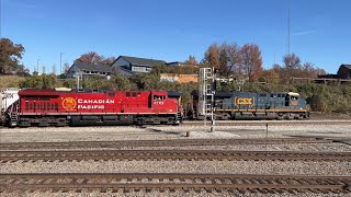 Two CSX Freights, P51, a Stack and 154 with UP Power at Howell Wye