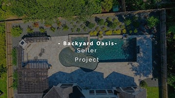 Luxury Custom Pool with Travertine Decking and Sun Shelf | Backyard Oasis