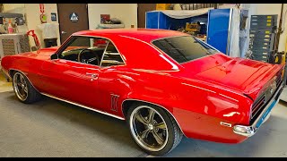 This is a MUST SEE, Mahoods Hot Rods, Classic Cars and Collision Center. Red 1969 Camaro