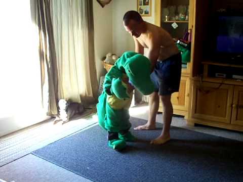 TJ doing cartwheels in a Alligator costume