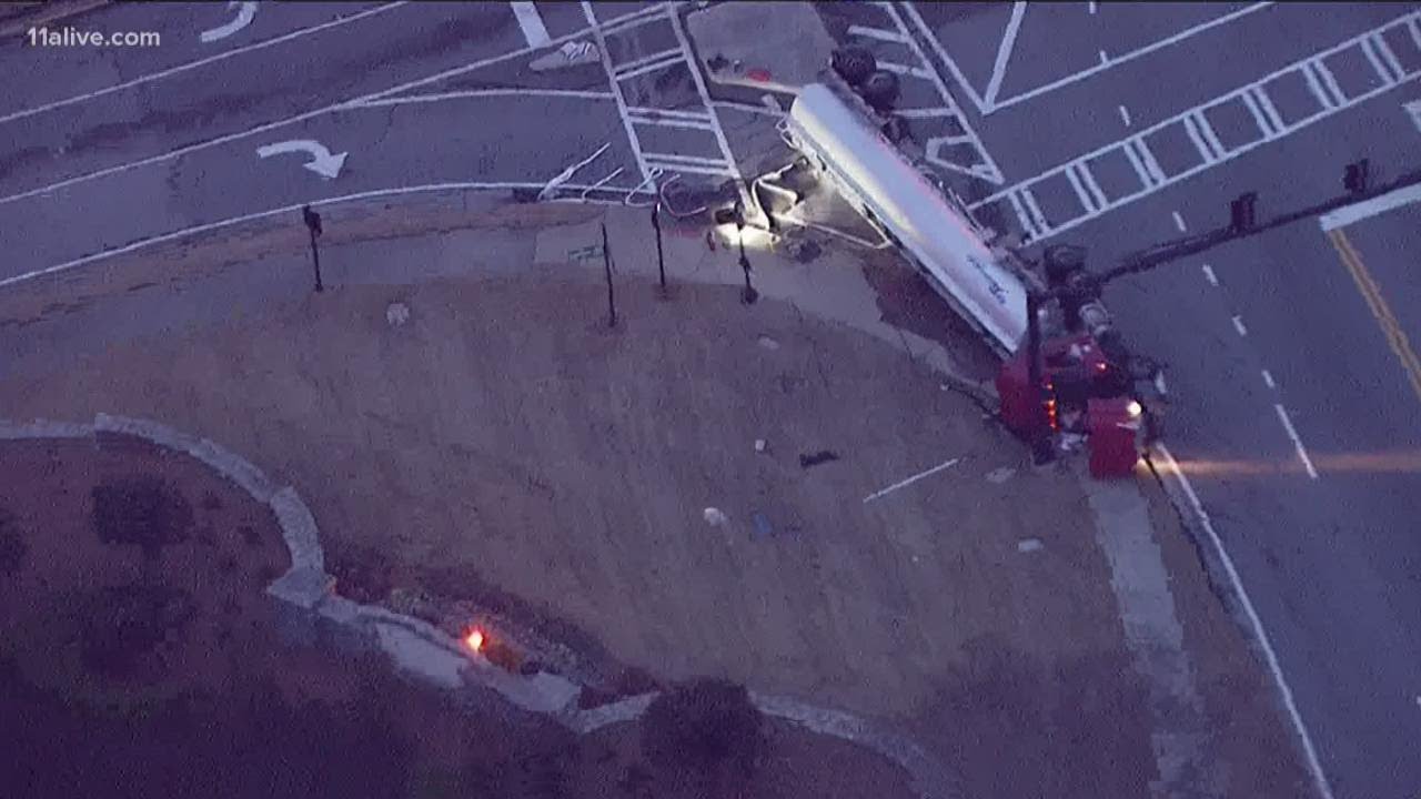 Overturned gasoline tanker leaks fuel onto Gwinnett roadway - YouTube