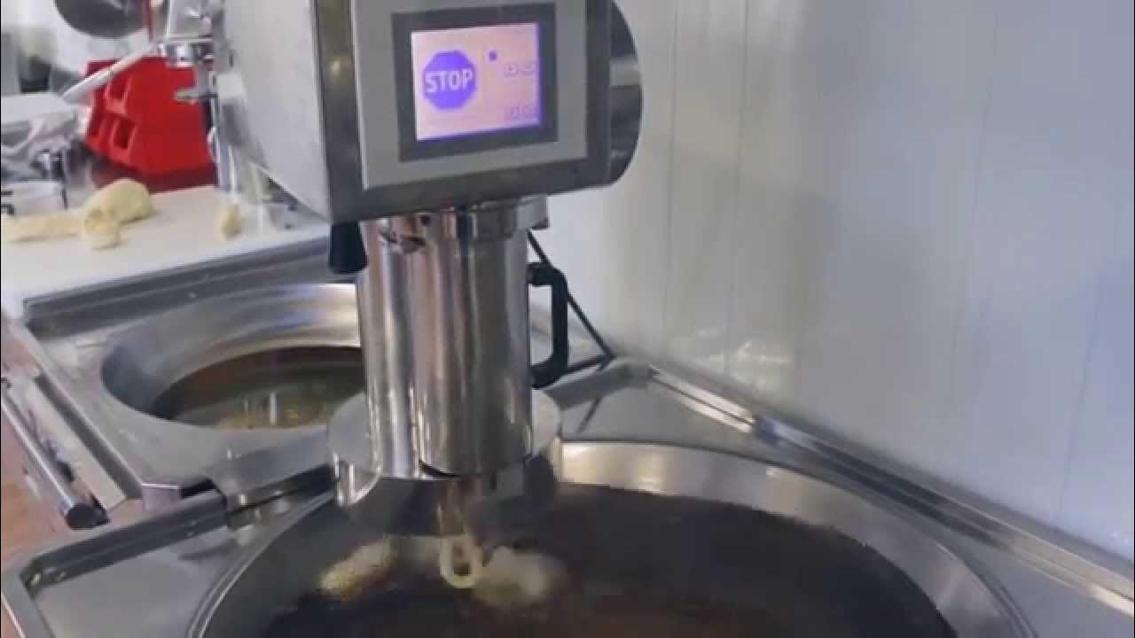 Máquina de churros automática haciendo churros rectos y de lazo 