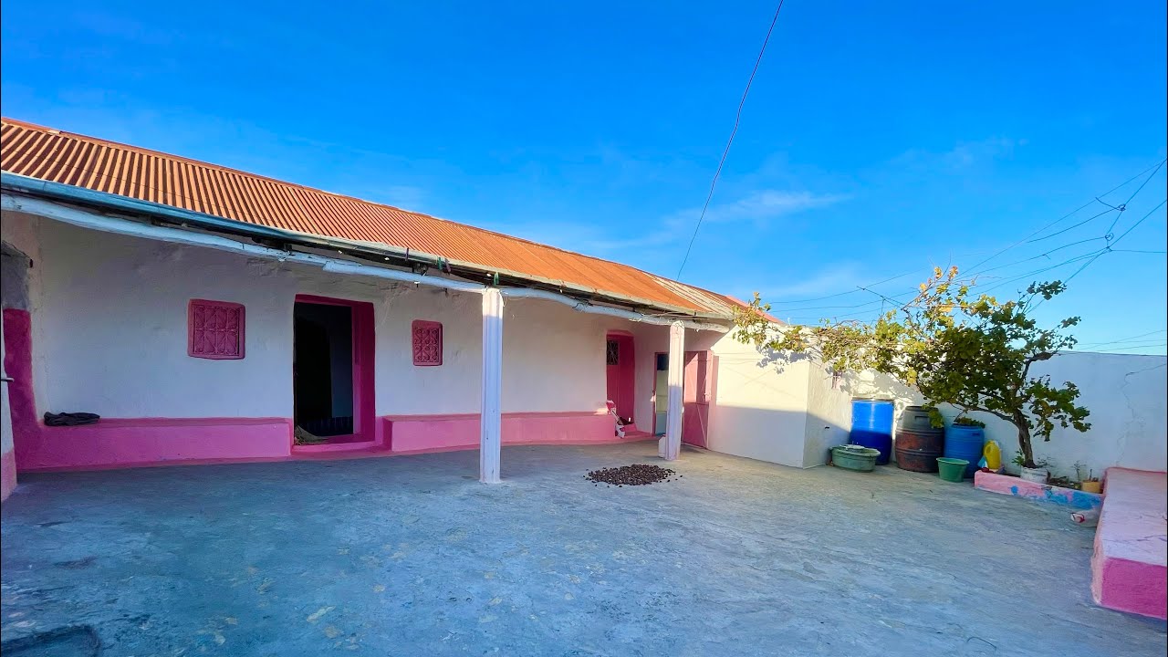 هميزة معتبرة دار بلدية وغرسة فيها جوج كوريات واشجار الفواكه 0703640826 نواحي الزميج طنجة