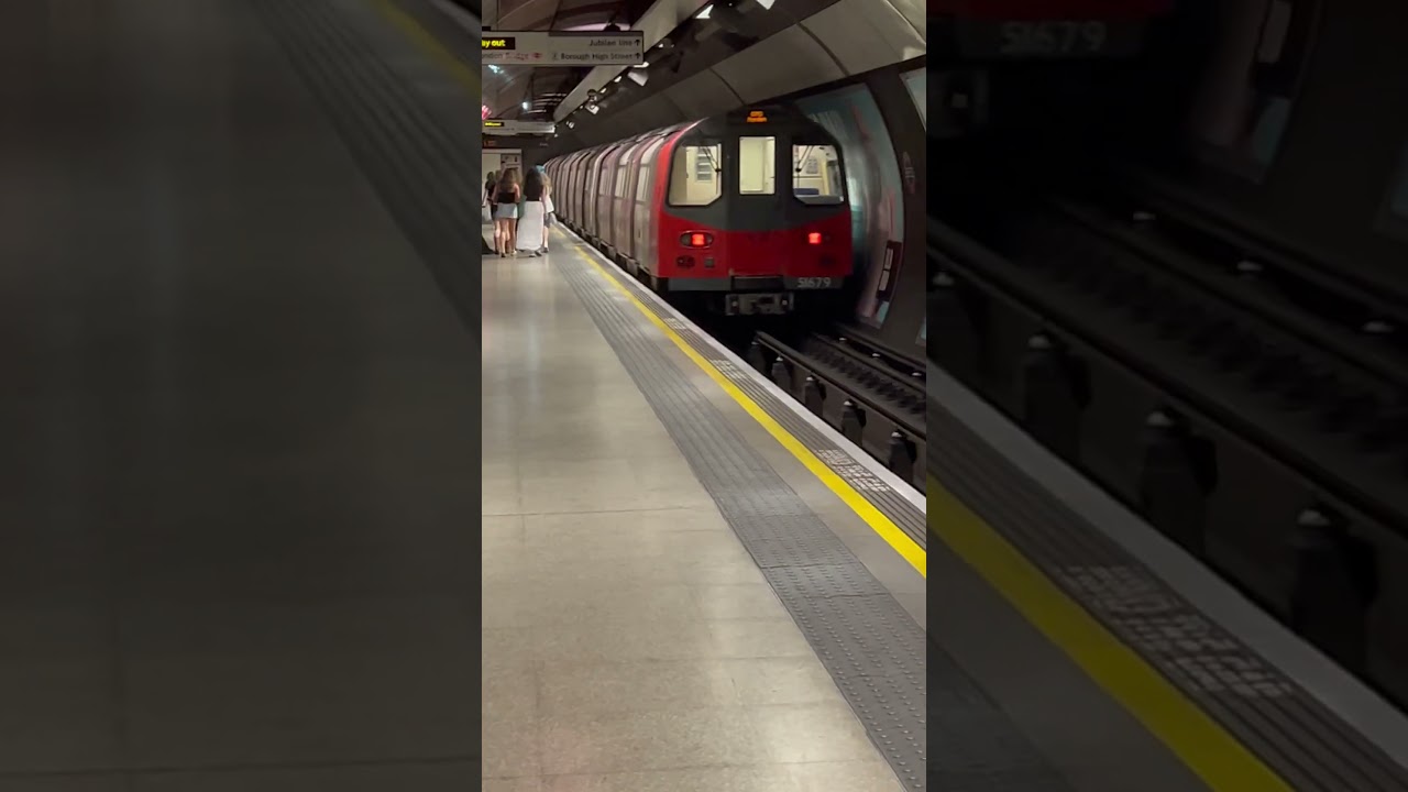 TFL London Underground Northern Line 1995 stock train departs London Bridge to head for Morden 