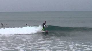 Christian Dorn with a cheater five at Lower Trestles