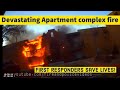 Heroic Firefighters and Police Officers Save Lives during a Raging Apartment Fire