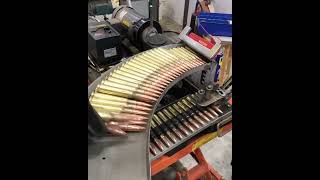 machine gun bullets belt loading##action#=reaction