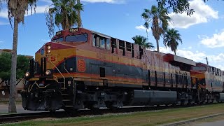 KCS 4824 leading KCS 4852 trailing eastbound empty grain train in Alice Texas