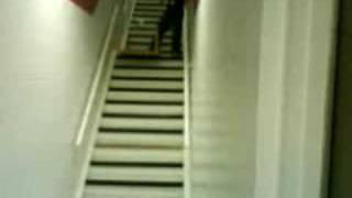 sledding downstairs on table at work