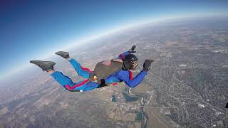 AFF Cat E2 Backflip Gone Bad... Crazy Spinning Instructor had to pull the pilot..