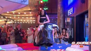 Beautiful Girl In Shorts Riding On A Bull In Benidorm | Bull Riding 4K