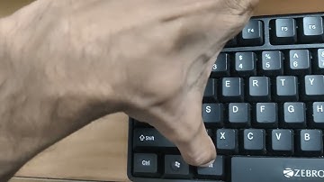 keyboard shortcut for top square bracket symbol