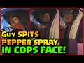 GUY SPITS PEPPER SPRAY AT COP!