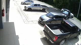Driver Not Paying Attention While Reversing Hits Parked Car