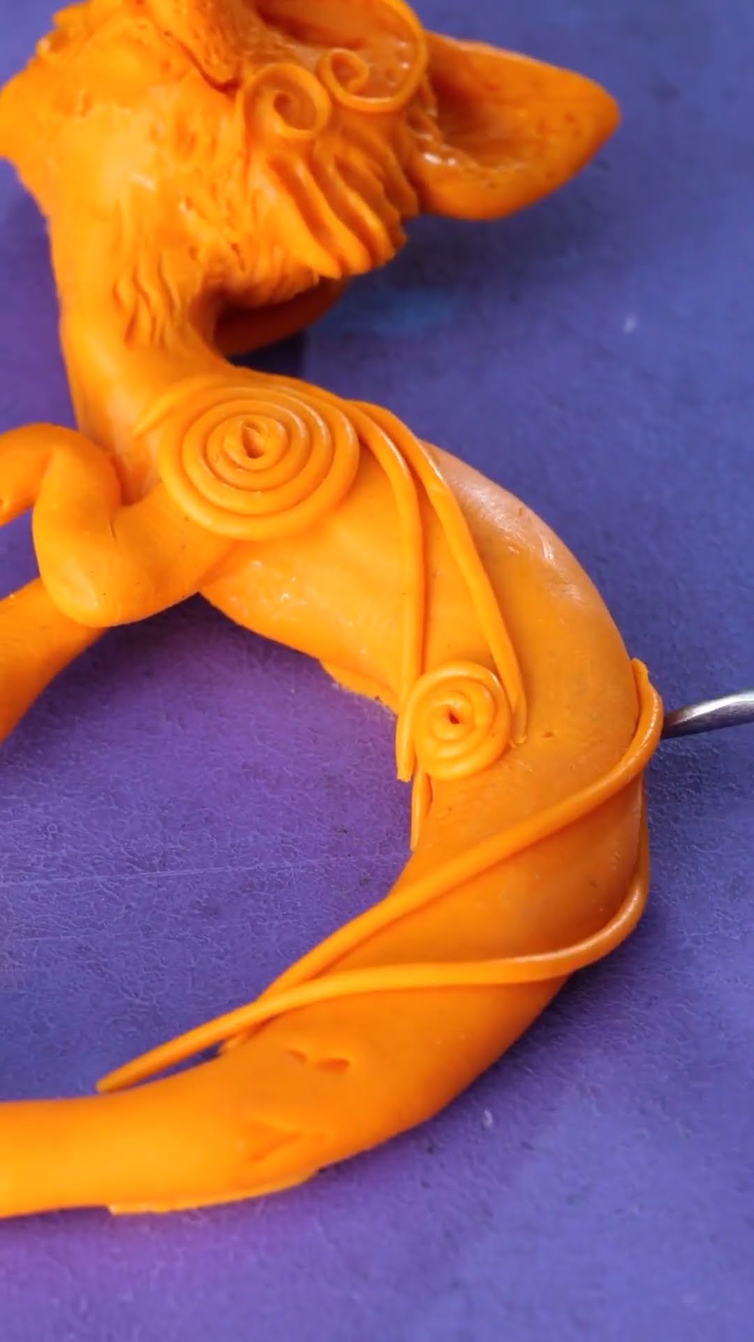 A fairy fox dragon earpiece created by the master ?