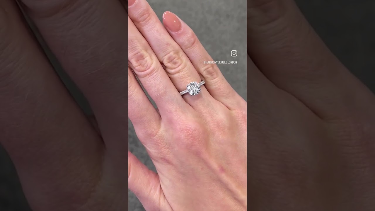 Round Cut Engagement Ring with Diamond Shoulders