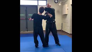 Wrist out turn to reverse hammer lock