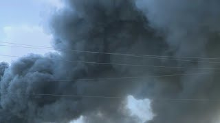 Breaking: 5-alarm junkyard fire forces evacuations in Opa-locka as thick smoke spreads