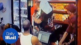 Suspect steals fried chicken and biscuits from Bronx restaurant - Daily Mail